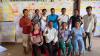 Group of people in Cambodia in front of boards filled with post-its