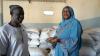 Los empleados de una cooperativa apoyada por la ADA en Senegal muestran con orgullo los productos cosechados. Copyright ADA